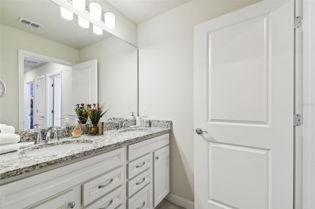 bathroom featuring vanity