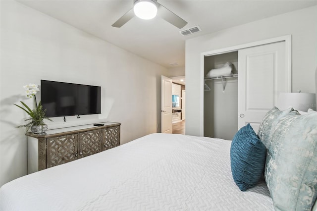 bedroom featuring a closet and ceiling fan