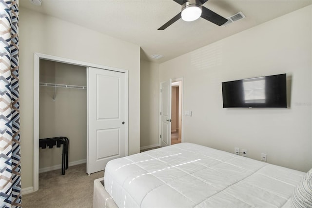 bedroom with carpet flooring, ceiling fan, and a closet