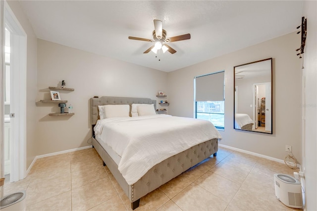 bedroom featuring ceiling fan and light tile patterned flooring