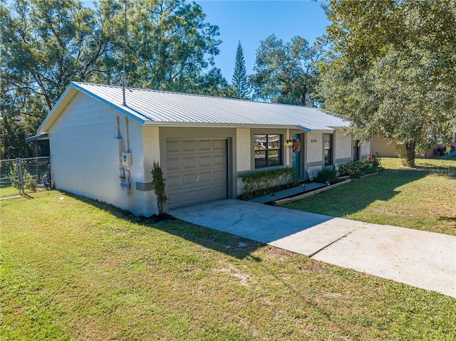 single story home featuring a front yard and a garage