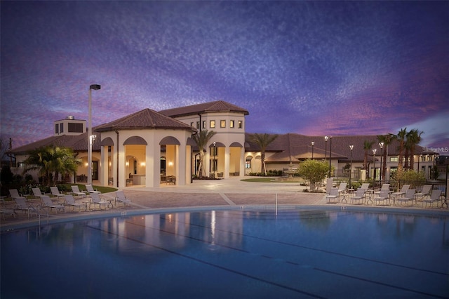 8932 Cabot Cliffs Dr, Davenport, FL 33896 - community pool with a patio area