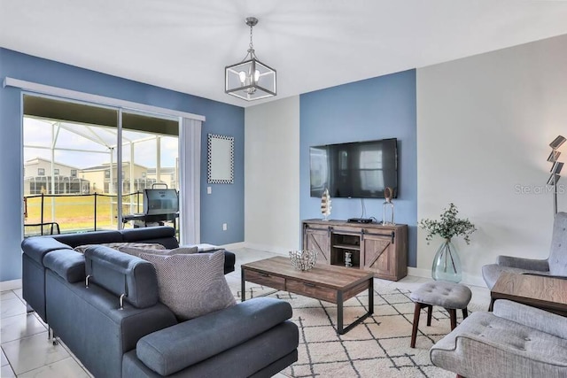 living room with an inviting chandelier