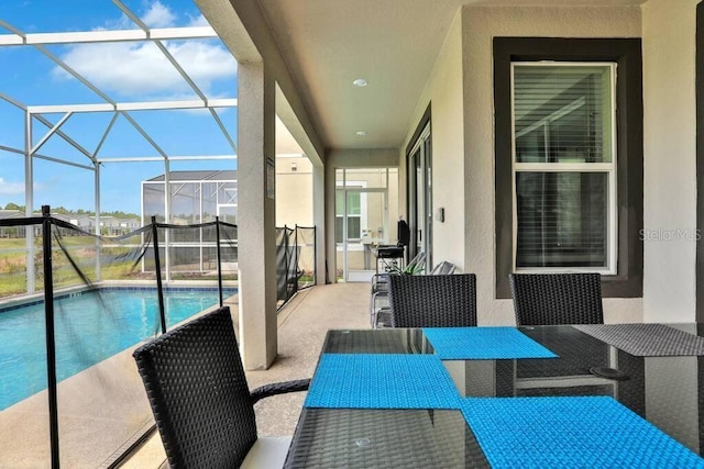 exterior space featuring a lanai and a patio area