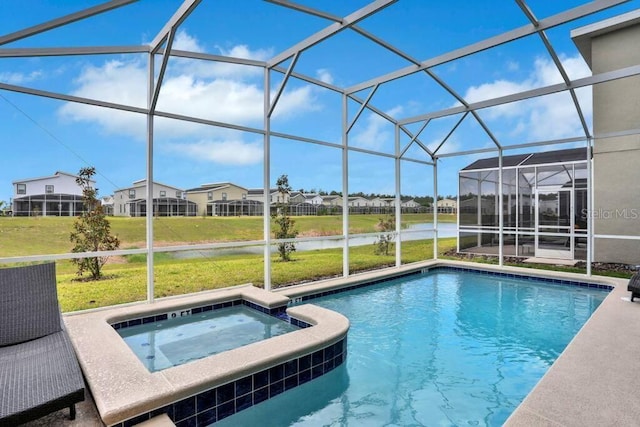8932 Cabot Cliffs Dr, Davenport, FL 33896 - view of swimming pool with glass enclosure, a yard, and a water view