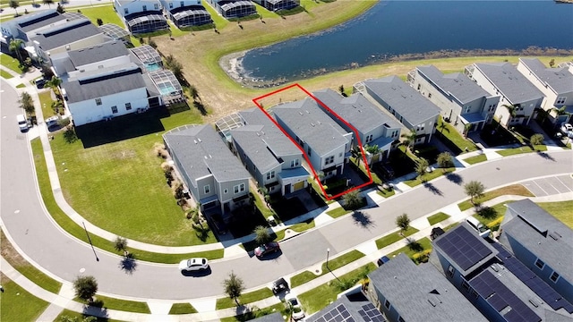 8932 Cabot Cliffs Dr, Davenport, FL 33896 - aerial perspective of suburban area with a large body of water and property boundaries highlighted