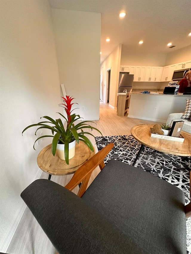 living room featuring light wood-type flooring