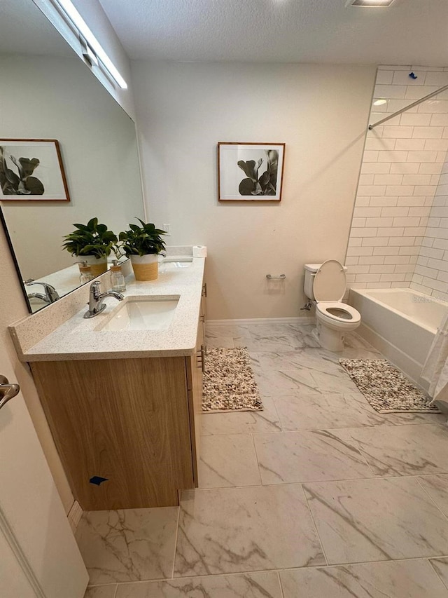 full bathroom featuring vanity, shower / bathtub combination, and toilet