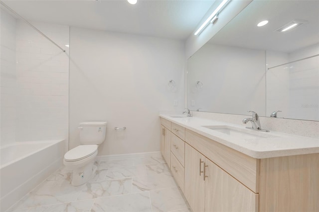 full bathroom featuring vanity, toilet, and tub / shower combination