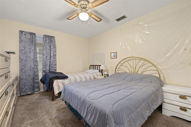 5846 Greenbriar Ct, Zephyrhills, FL 33542 - carpeted bedroom with a textured ceiling and a ceiling fan