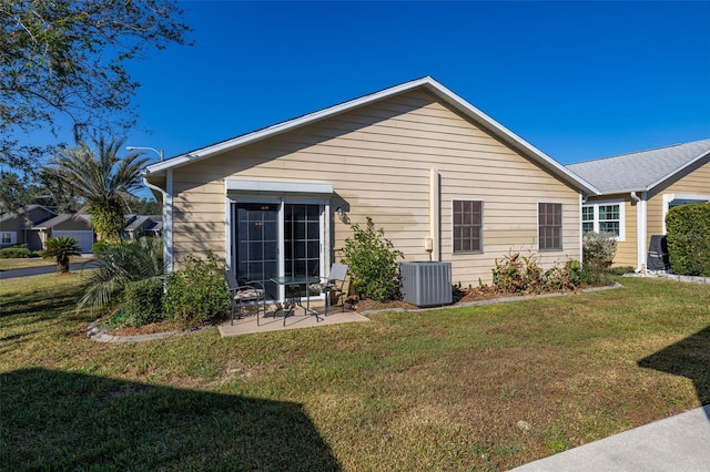 5846 Greenbriar Ct, Zephyrhills, FL 33542 - back of house with a yard and a patio