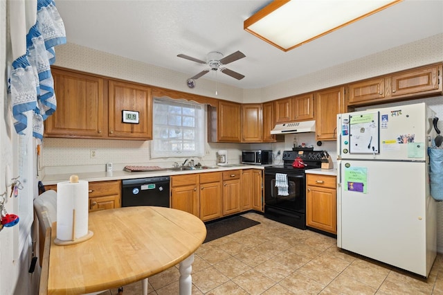 5846 Greenbriar Ct, Zephyrhills, FL 33542 - kitchen featuring black appliances, under cabinet range hood, a ceiling fan, and light countertops