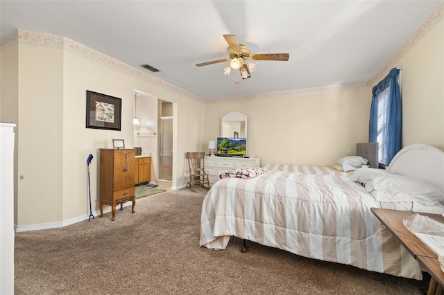 5846 Greenbriar Ct, Zephyrhills, FL 33542 - carpeted bedroom with ceiling fan and ensuite bath