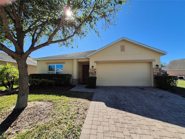 single story home with a garage