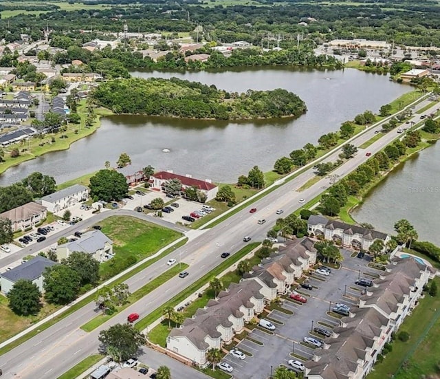 drone / aerial view with a water view