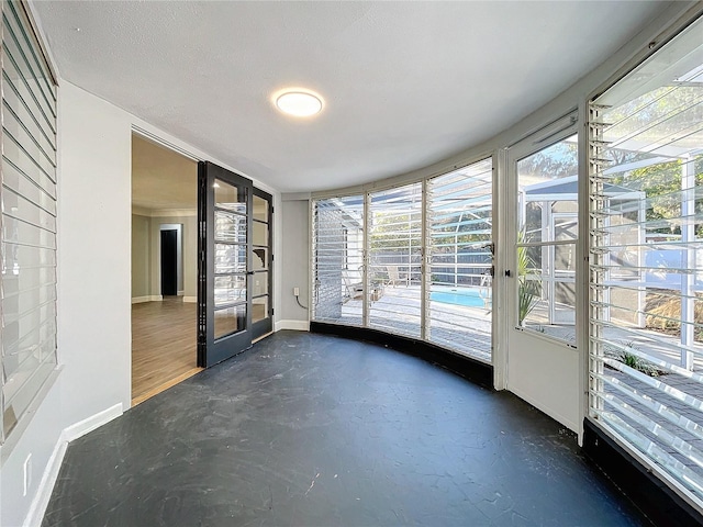 entryway featuring french doors