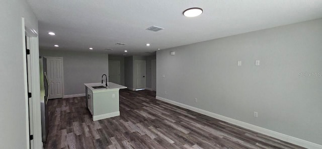 1030 Darlington Ct, Kissimmee, FL 34758 - empty room featuring dark wood-style floors and recessed lighting