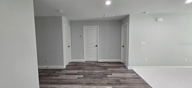 1030 Darlington Ct, Kissimmee, FL 34758 - unfurnished room featuring wood finished floors and recessed lighting