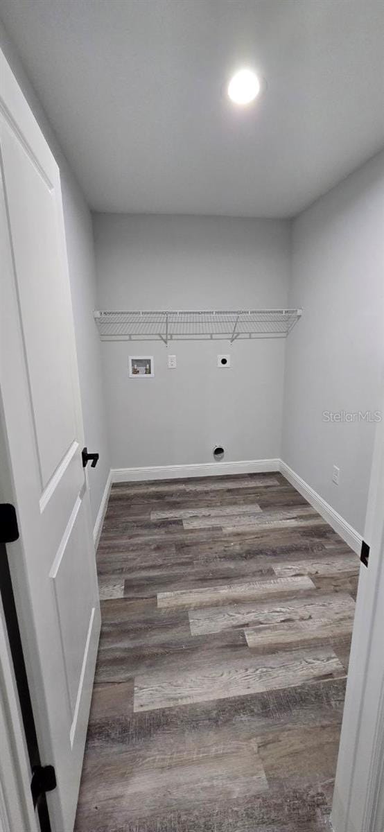1030 Darlington Ct, Kissimmee, FL 34758 - laundry room featuring hookup for a washing machine, electric dryer hookup, and wood finished floors