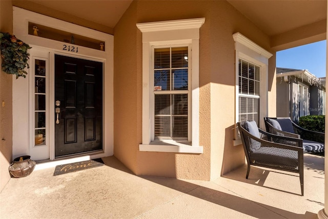 property entrance with a porch