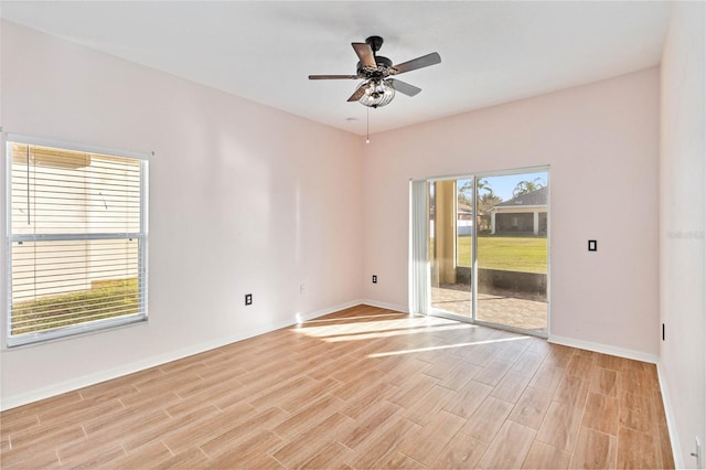 spare room featuring ceiling fan and light hardwood / wood-style floors