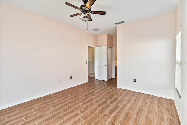 spare room with ceiling fan