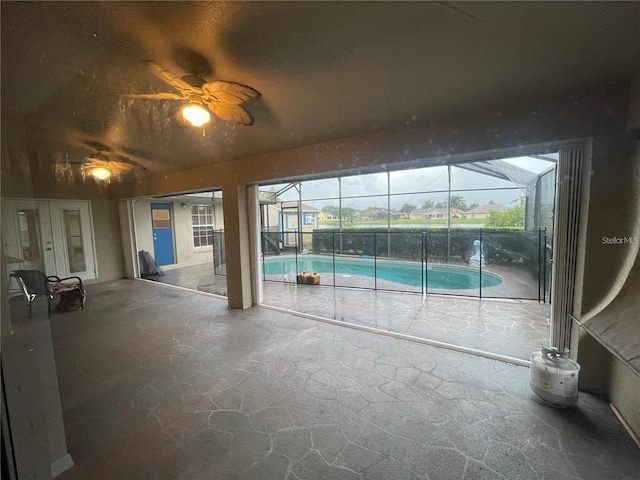 view of pool featuring ceiling fan