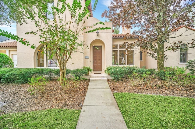 1233 Aquila Loop, Celebration, FL 34747 - mediterranean / spanish home with stucco siding and a tiled roof