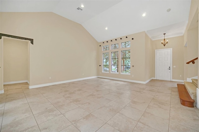 unfurnished living room featuring lofted ceiling, crown molding, light tile patterned floors, and an inviting chandelier