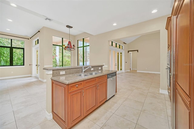 1233 Aquila Loop, Celebration, FL 34747 - kitchen featuring a sink, dishwasher, brown cabinetry, light tile patterned floors, and recessed lighting