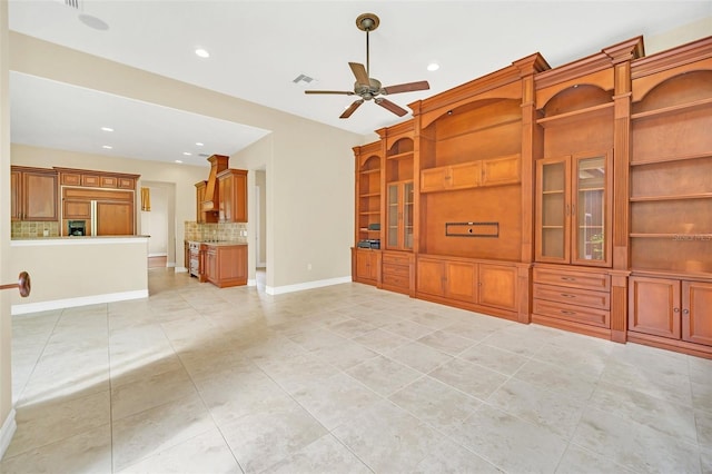 1233 Aquila Loop, Celebration, FL 34747 - unfurnished living room featuring ceiling fan, light tile patterned flooring, recessed lighting, and baseboards