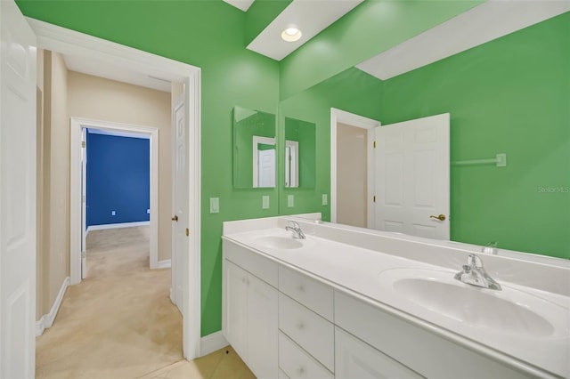 1233 Aquila Loop, Celebration, FL 34747 - bathroom with double vanity and baseboards
