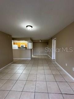 interior space with light tile patterned floors