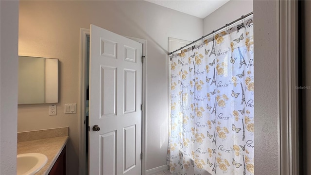 bathroom with vanity and shower / bathtub combination with curtain