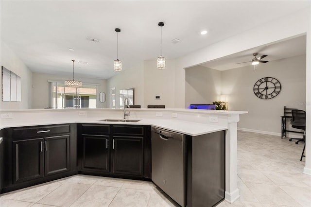 kitchen featuring sink, stainless steel dishwasher, ceiling fan, light tile patterned floors, and decorative light fixtures