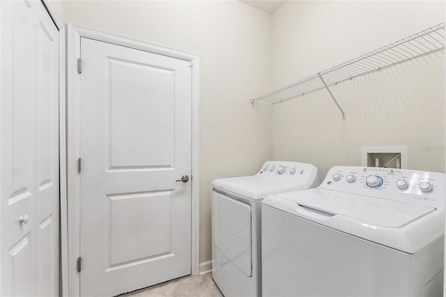 laundry area featuring separate washer and dryer