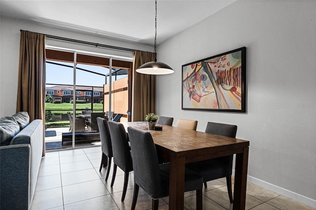 tiled dining room with plenty of natural light