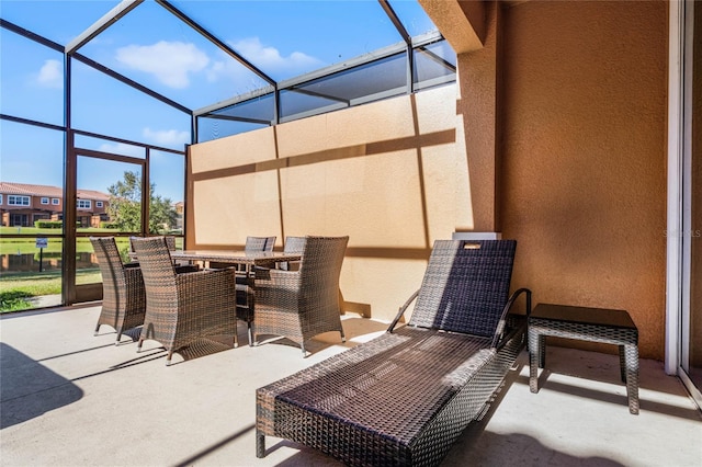 view of patio / terrace with glass enclosure