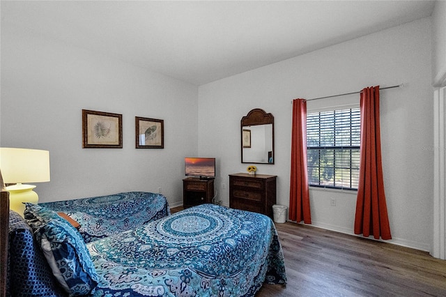 bedroom featuring hardwood / wood-style floors