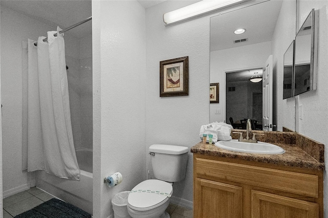 full bathroom featuring toilet, shower / tub combo with curtain, vanity, and tile patterned flooring