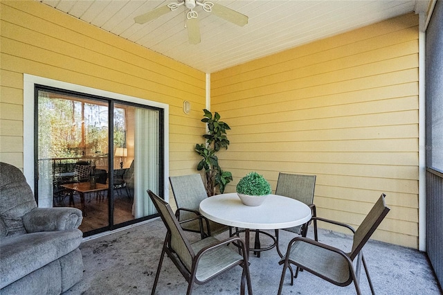 exterior space featuring ceiling fan