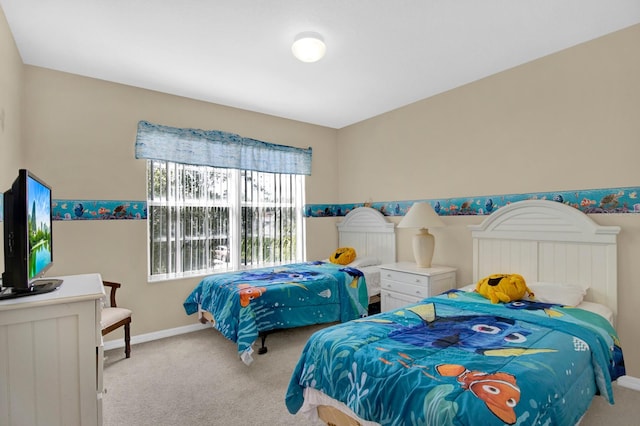 bedroom featuring light colored carpet