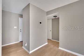 hall featuring light hardwood / wood-style floors