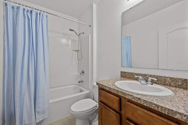 full bathroom featuring tile patterned floors, vanity, shower / bath combo, and toilet