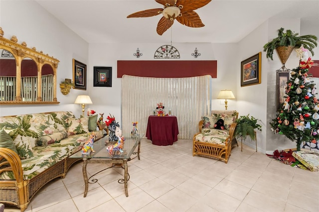 living room with ceiling fan and light tile patterned floors