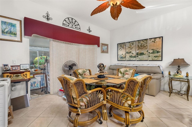 dining room featuring ceiling fan and light tile patterned floors