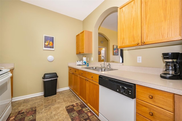 kitchen with white appliances and sink