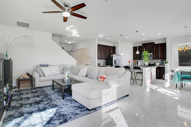 living room with ceiling fan