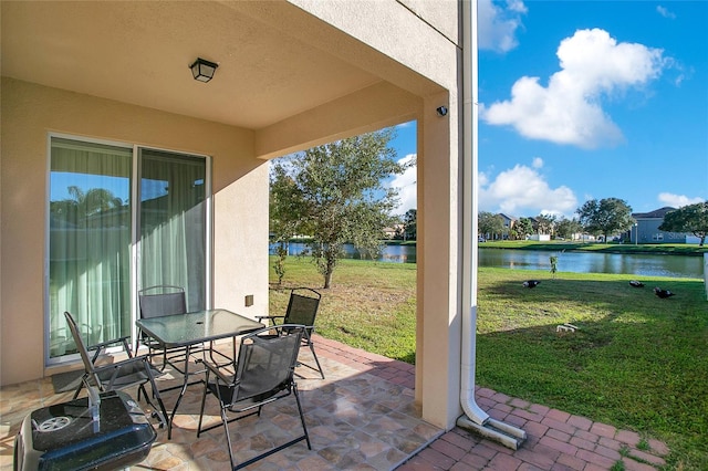 view of patio / terrace featuring a water view