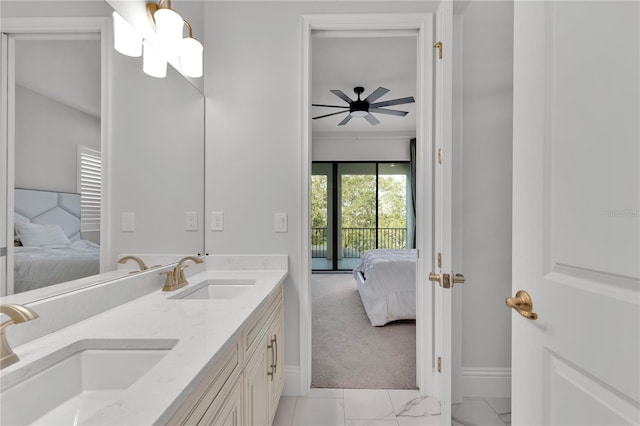 bathroom featuring ceiling fan and vanity